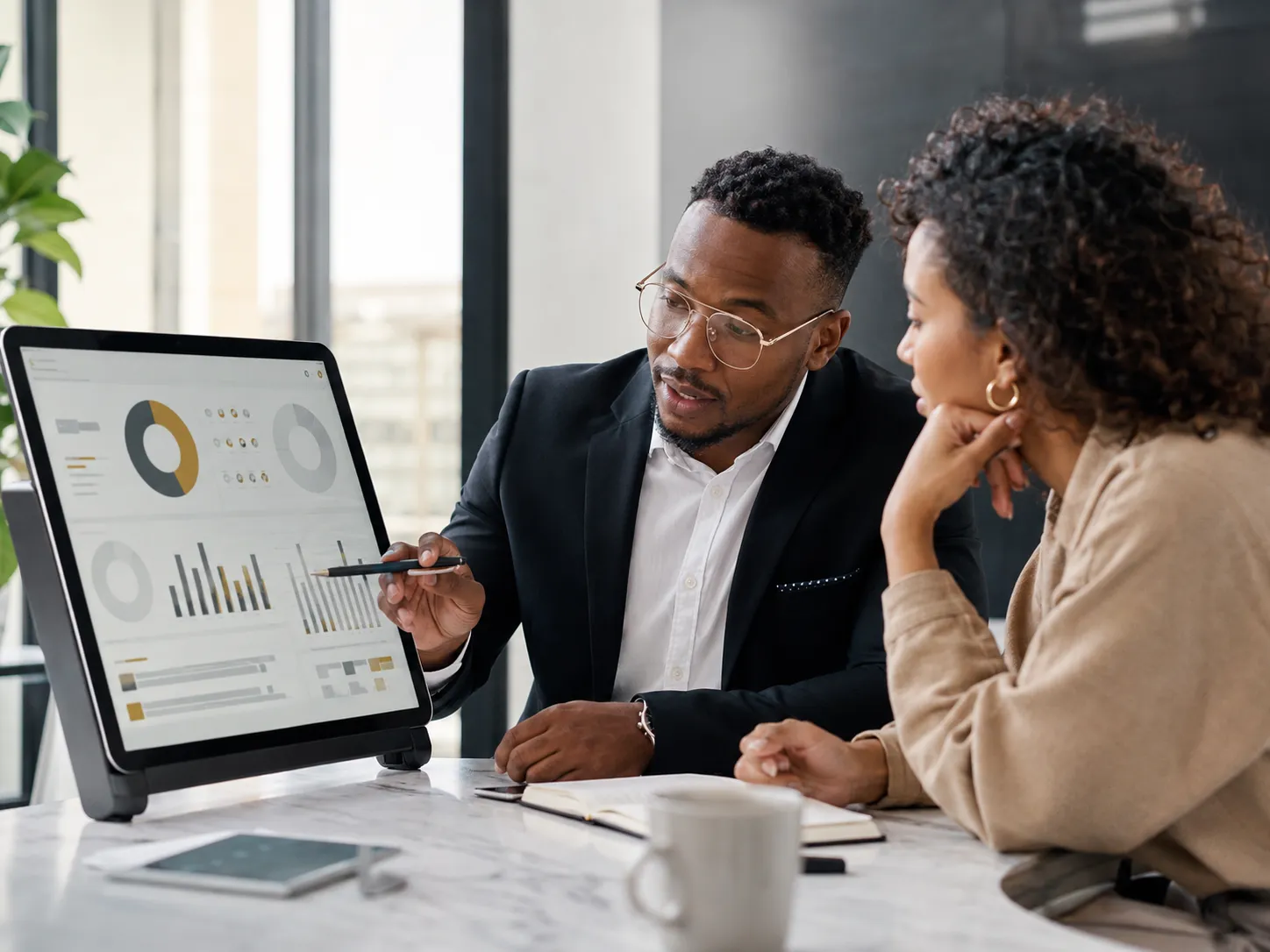 Financial adviser comparing unit trust fund options with a client